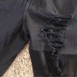 Fashion Nova long distressed shorts